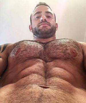 Hairy Gay Porn Caption - Between his muscular legs!