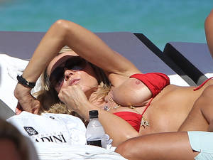 bikini oop nip slip at beach - Rita Rusic Red Bikini Nipple Slip In Miami