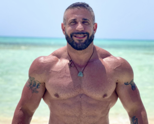 Italian University Porn - Muscle daddy professor wins case against university that fired him for his  gay adult film past - Queerty