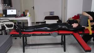 asian bodystocking latex and boots - BoundHub - Asian Latex Catsuit Table Tape Bondage