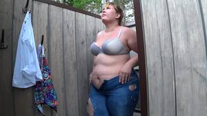 bbw fat voyeur - A chubby girl with a fat butt on a public beach changes clothes in a  swimsuit. - XNXX.COM