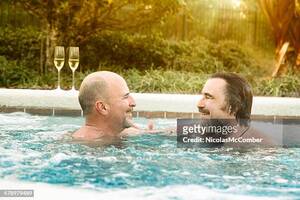 Hairy Gay Porn Pool - Two Mature Gay Men Bear Connecting In Hot Tub High-Res Stock Photo - Getty  Images