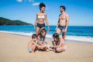 free voyeur beach ocean pictures - Family Nudism Images - Free Download on Freepik