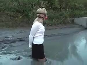 Mud Bondage Porn - BoundHub - Girl is Gagged with Hands Tied In Mud