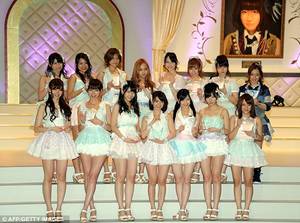 Japan Toddler Porn - Japanese phenomenon: Tomomi Kasai pictured sixth from left, back row, is  pictured with