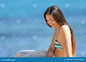 barefoot beach girls voyeur - Candid Woman in Bikini Sitting on the Beach Stock Photo - Image of adult,  meditating: 145648224