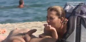 boner on nude beach - Amateur wife is touching husbands boner on nude beach VIDEO Public Flashing