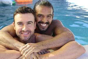 Hairy Gay Porn Pool - Happy Young Gay Couple Enjoying Time Together Pool Paper Cups Stock Photo  by Â©albejor2002@hotmail.com 499487726