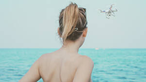 free voyeur beach ocean pictures - Drone voyeurs in hot water after filming nude sunbathers