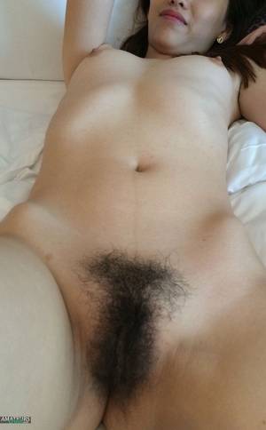 Chinese Hairy Pussy Wives - Mature Chinese wife with very hairy bush on bed