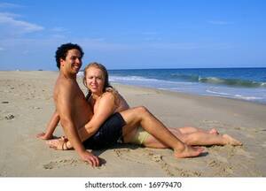 couple nude beach xxx - Interracial Couple On Beach Stock Photo 16979467 | Shutterstock