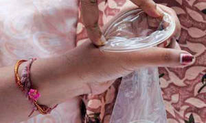 Comdom Porn - Female condom demonstration/AFP