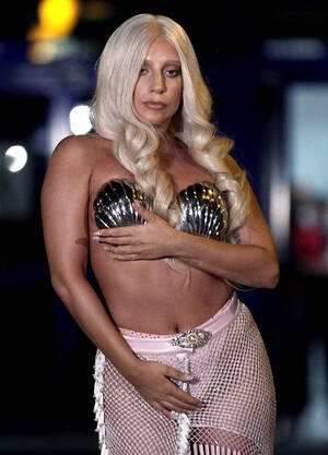 lady gaga - Lady Gaga arrives in just a thong and sea shell bra at Athens airport -  India Today