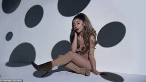 Ariana Grande Forced Porn - Ariana Grande plays Austin Powers 'fembot' for 34+35 music video | Daily  Mail Online