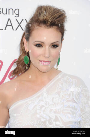 alyssa milano upskirt - Alyssa milano hi-res stock photography and images - Alamy