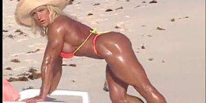 beach milf videos - Erotic muscle MILF Peggy bares her vascular hard body at the beach