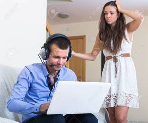 husband home - Furious wife catching husband watching porn at home Stock Photo - 47625572