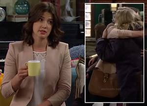 how i met your mother - Robin's beige blazer, white lace top and tan purse on How I Met Your Mother