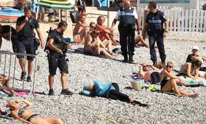 amateur nude beach sex videos - French police make woman remove clothing on Nice beach following burkini  ban | France | The Guardian