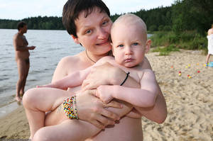 all nudist and naturist galleries - COM - Naturist Mother Brings Baby to Nude Beach Cookout Picture