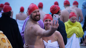 free nudist dam - Thousands brave morning freeze to bare all at Dark Mofo nude swim - ABC News