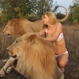 Lion Porn Captions - Porn star Katya Sambuca poses semi naked straddling two LIONS that were  snarling and snapping in discomfort sparking animal rights outrage | The Sun