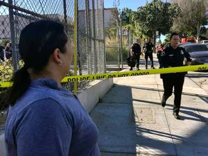 American Middle School Student Porn - PHOTO: Gloria Echeverria watches as Los Angeles police officers close off a  street where a