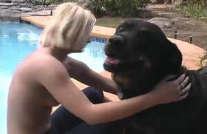 Girl Sex With Rottweiler - After swimming, aroused MILF wants Rottweiler to fuck her twat